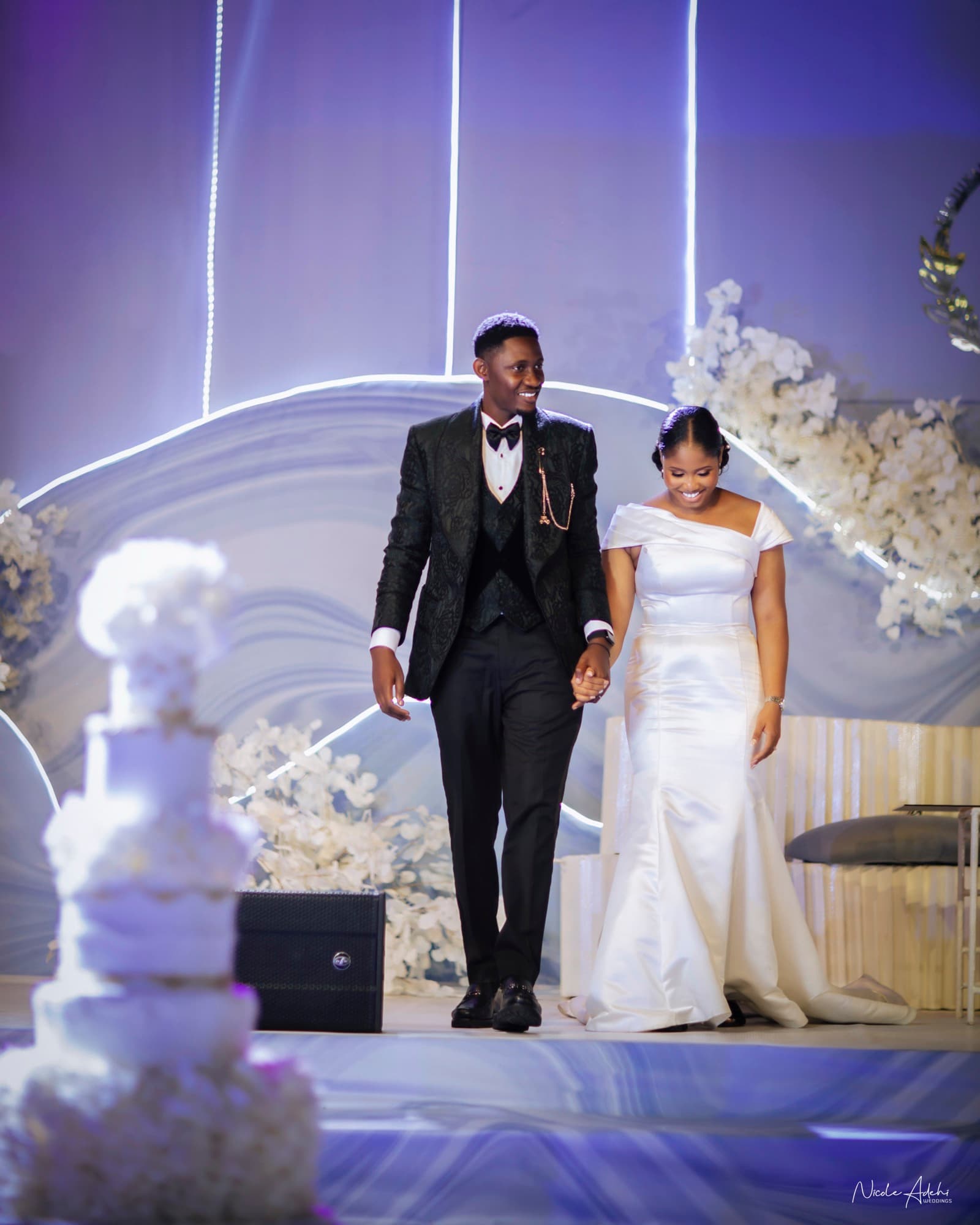 A tender moment at the white wedding.