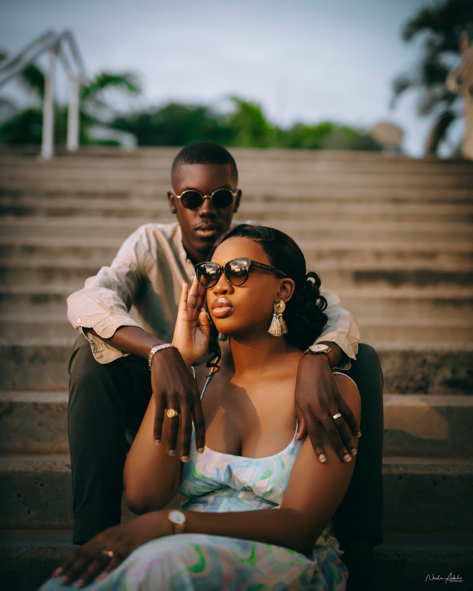 Ore and Esi in an editorial post-wedding portrait, dressed in their finery.