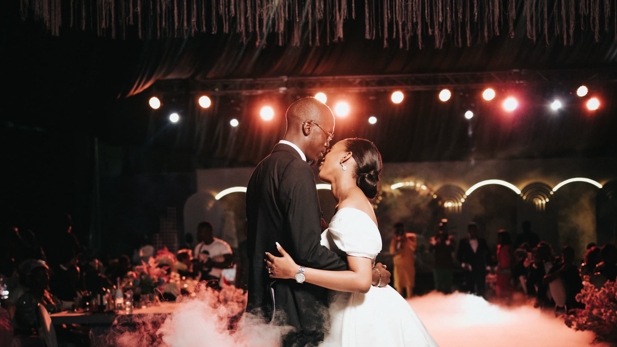 Ore and Esi share their first dance at the white-wedding reception.